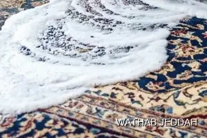 فريق وثاب جدة أثناء تنظيف سجاد في حي الياقوت بجدة