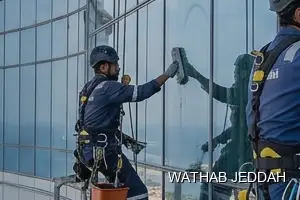 Wathab Jeddah team performing Glass Facade Cleaning in Al Riyadh, Jeddah