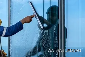 Wathab Jeddah team performing Glass Facade Cleaning in Al Thaghr, Jeddah