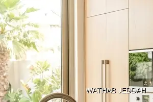 فريق وثاب جدة أثناء تنظيف مطابخ في حي المرجان بجدة