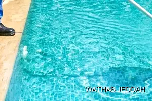 Wathab Jeddah team performing Swimming Pool Cleaning in Al Samer, Jeddah